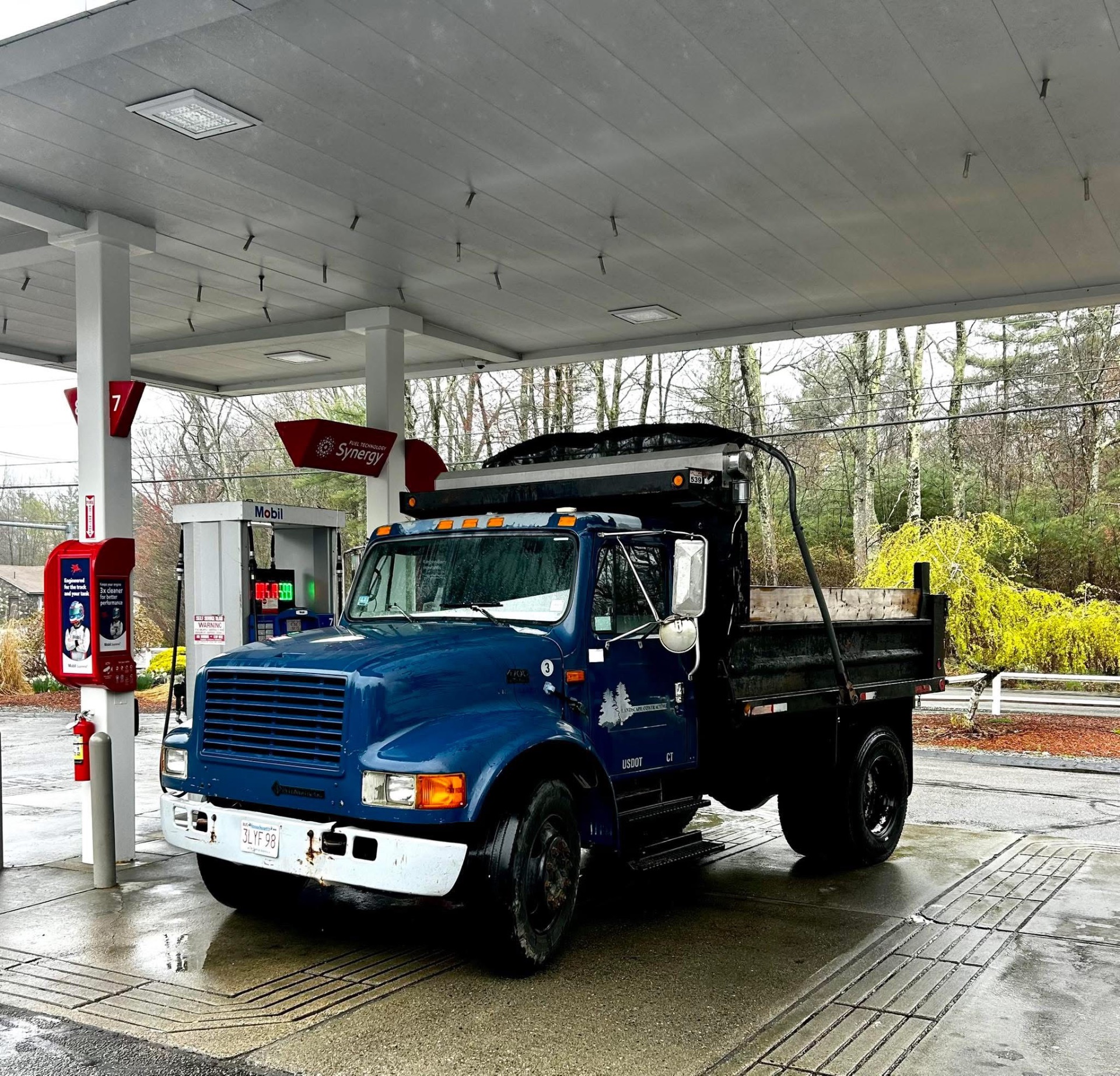 Mendyk landscape contracting dump truck fueling up before a job